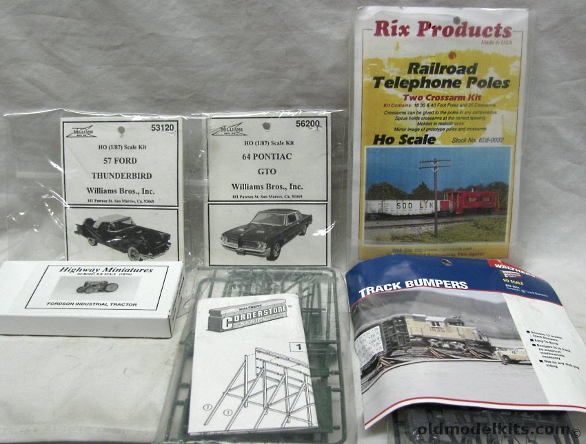 Assorted 1/87 Williams Brothers 1964 Pontiac GTO Kit / Williams Brothers 1957 Ford Thunderbird Kit / Walthers Cornerstone Plain Billboards (2 Pack) / Highway Miniatures Fordson Industrial Tractor / Walthers Track Bumpers / Rix Products (16) Telephone Poles and (36) Cro plastic model kit